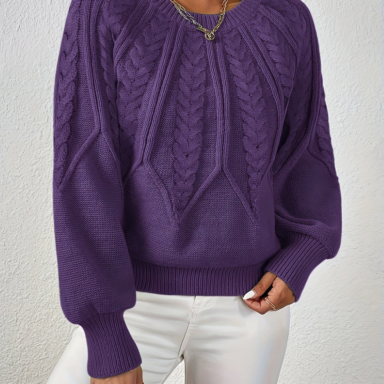 Women’s cable knit sweater with lantern sleeves, dark purple, textured cable yoke.