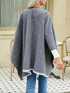Blue-gray cashmere poncho with V-neck, draped sleeves, fringe hem