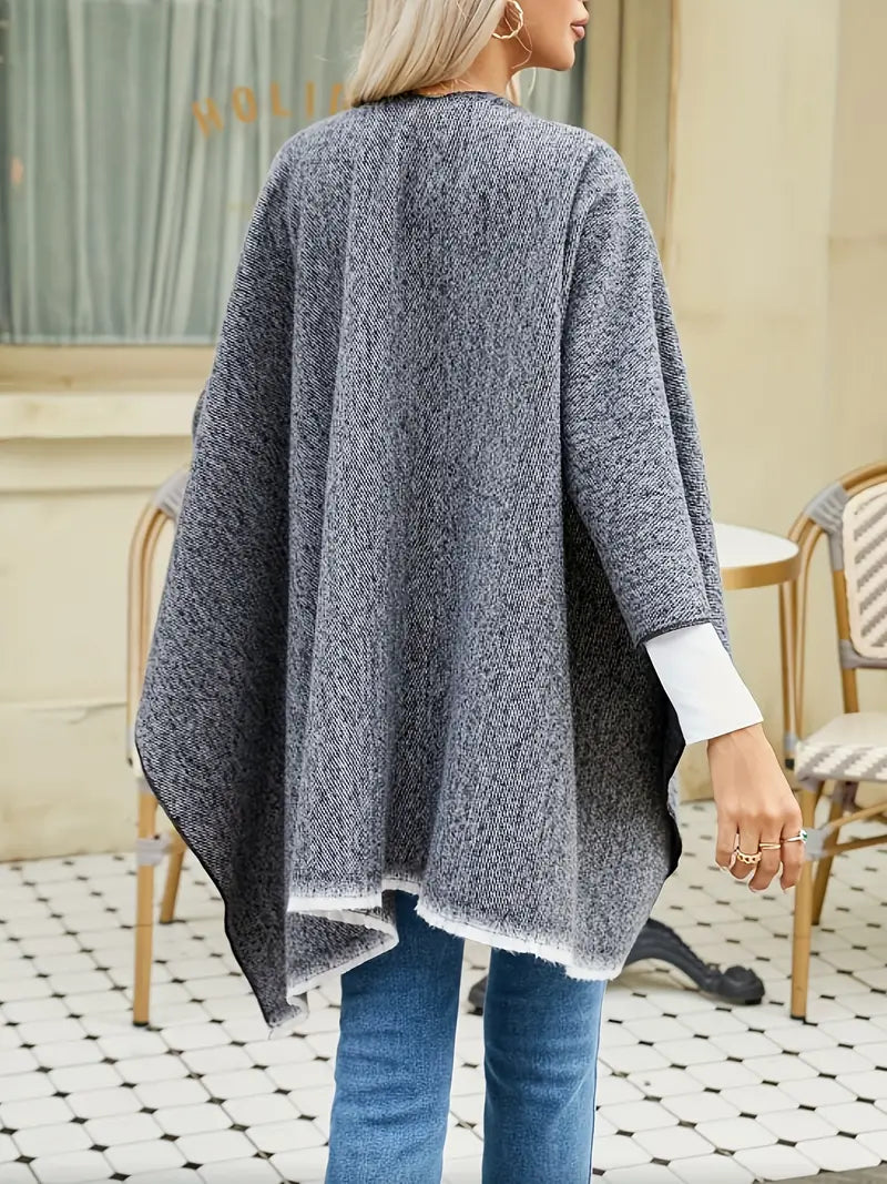 Blue-gray cashmere poncho with V-neck, draped sleeves, fringe hem