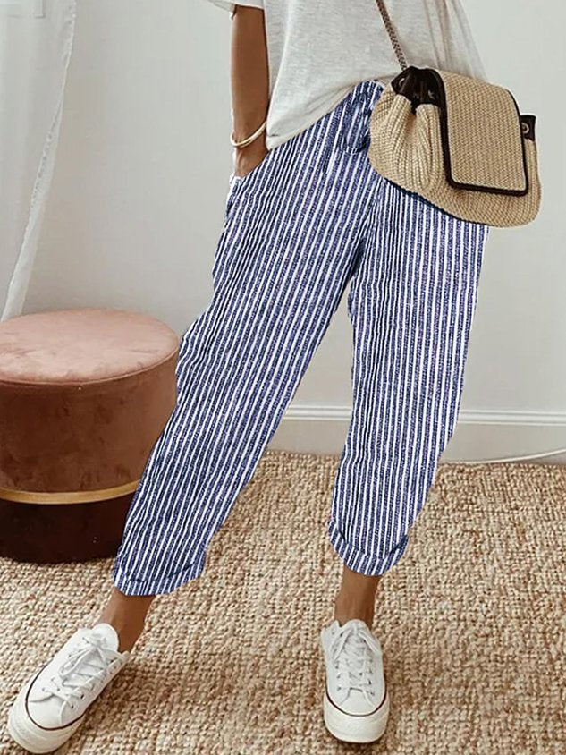 Women’s anti-sweat pants in blue pinstripe, cuffed ankle, drawstring waistband