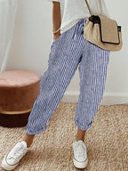 Women’s anti-sweat pants in blue pinstripe, cuffed ankle, drawstring waistband