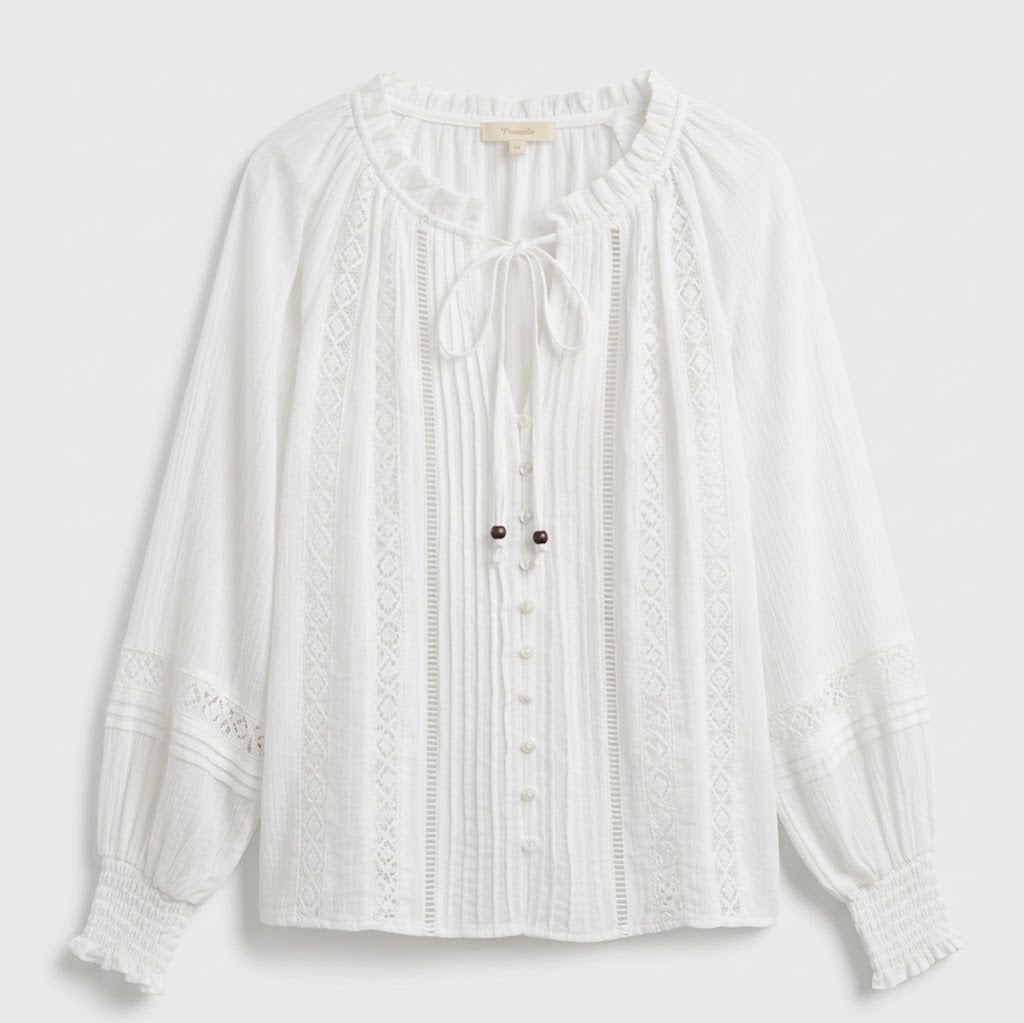 White boho V-neck relaxed blouse with lace trim, long sleeves, button front