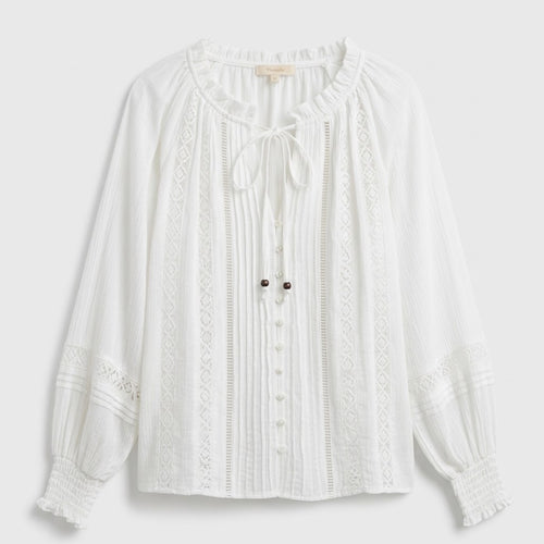 White boho V-neck relaxed blouse with lace trim, long sleeves, button front