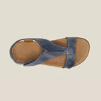 Dark blue comfort sandals with adjustable cross strap and cushioned footbed