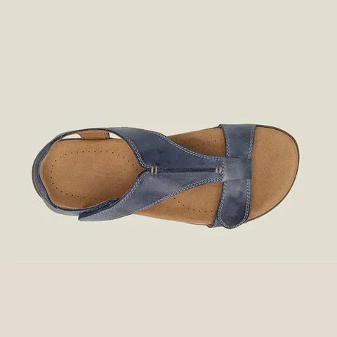 Dark blue comfort sandals with adjustable cross strap and cushioned footbed