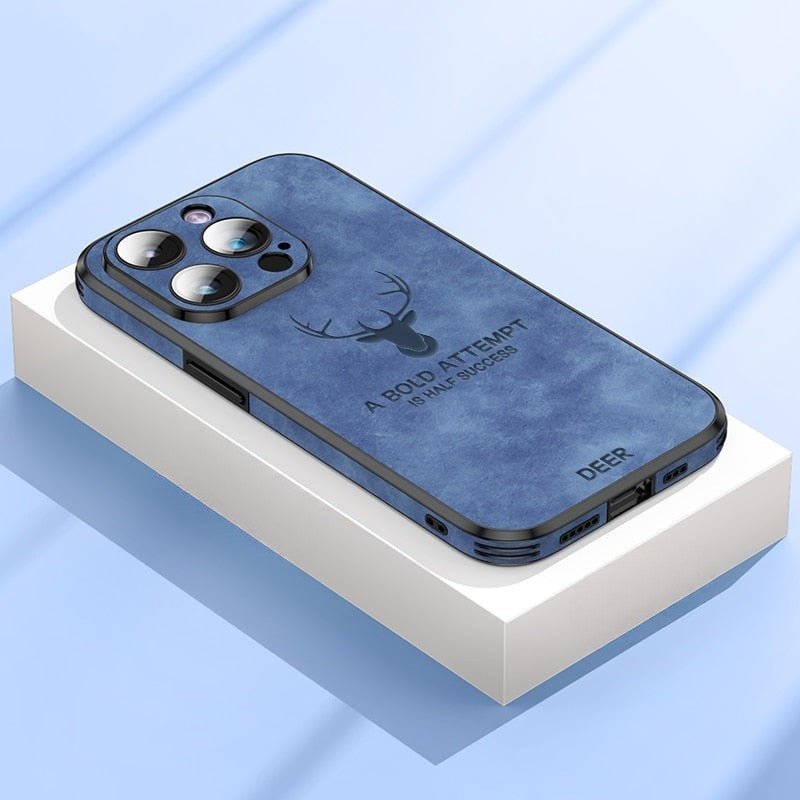 Deer leather iPhone case in blue on a box, showing camera cutouts and side ports.