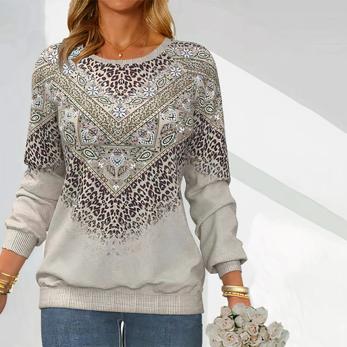 Light gray leopard print sweater with bandana yoke, ribbed cuffs and hem, crew neck