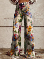 High-waist wide-leg pants with colorful butterfly and floral print on light base