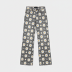 High-waist wide-leg pants with daisy print in white on dark gray fabric