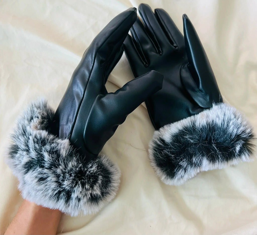 Dark leather gloves with fluffy light gray faux fur cuffs and quilted palm texture.