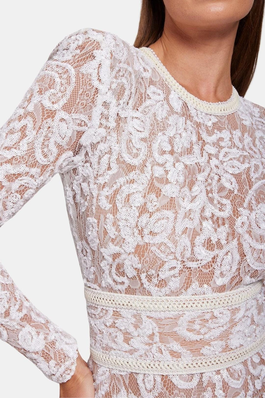 White lace long-sleeve jumpsuit with crew neck and scalloped lace trim