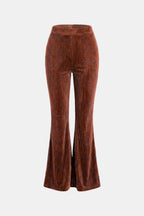 Rust brown flared corduroy trousers, straight waist to wide bootcut hem