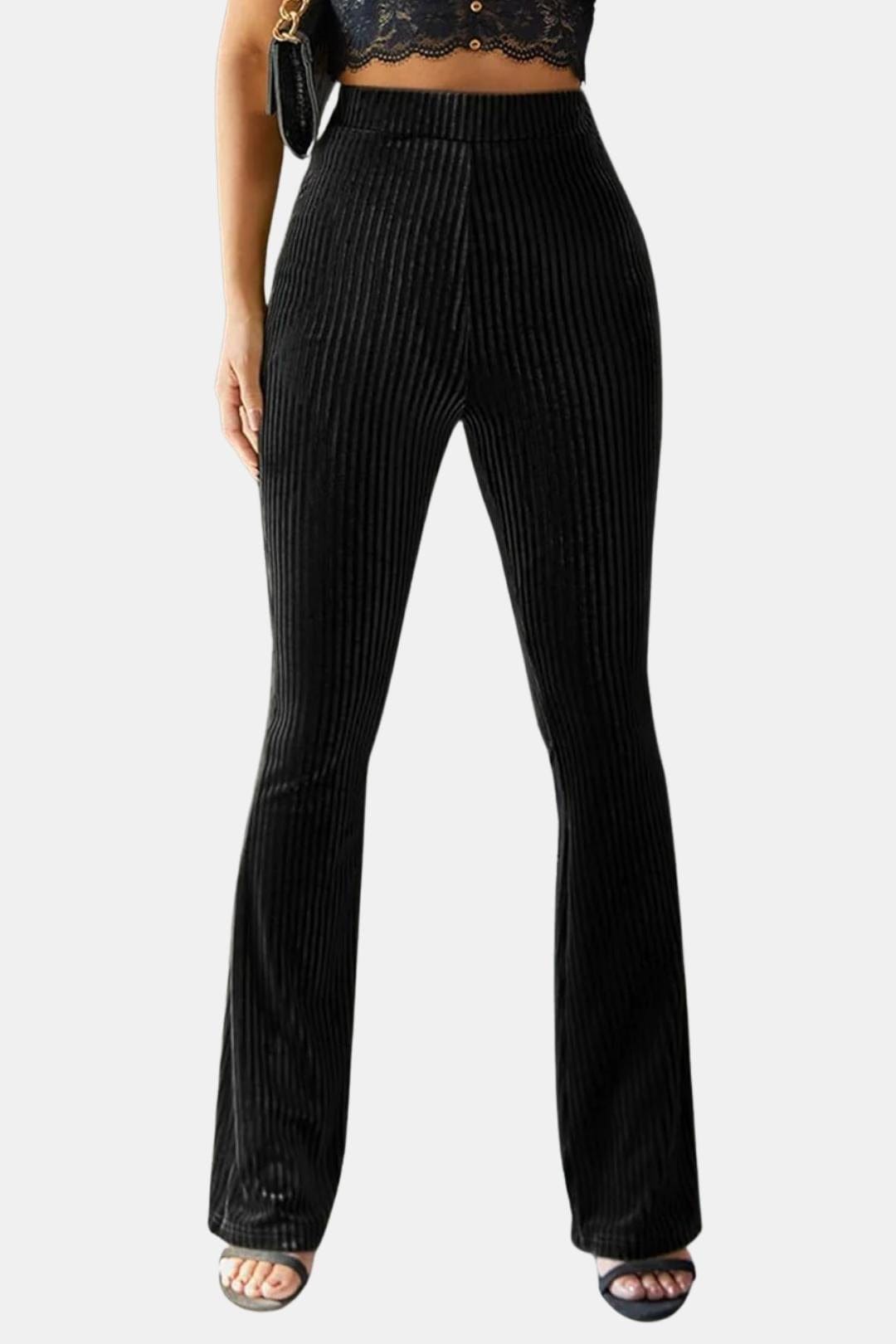 Black flared corduroy trousers with vertical rib texture and fitted waist