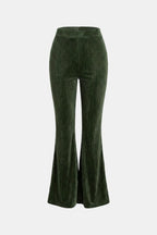 Dark green flared corduroy trousers with wide bootcut flare and ribbed texture