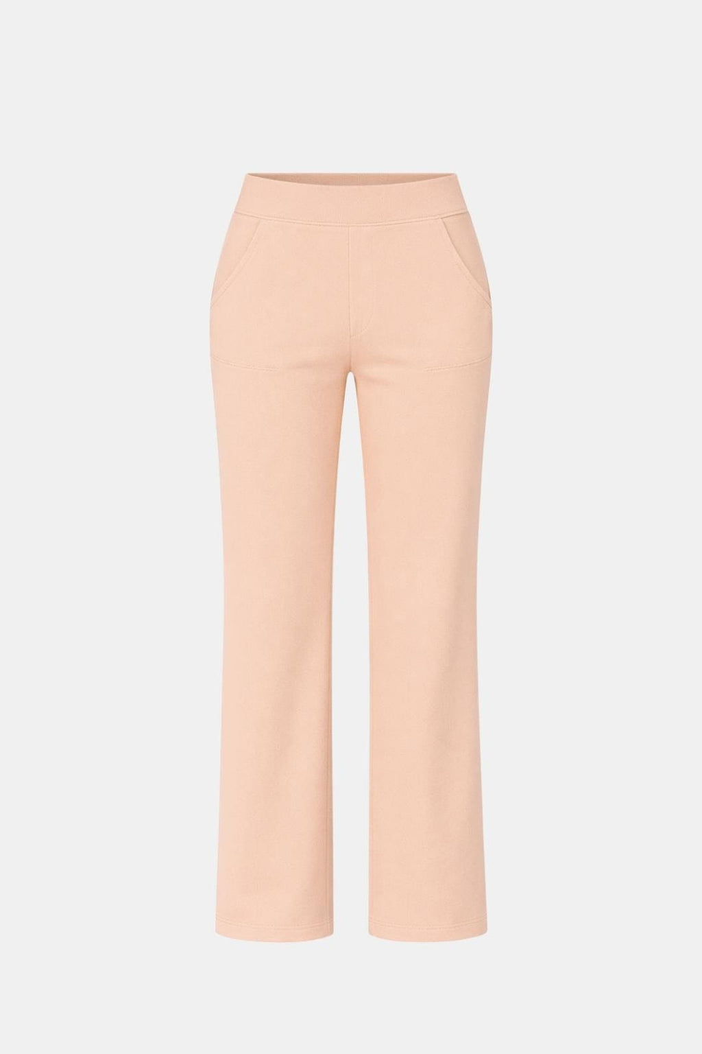 High-waist stretch straight-leg pants in light peach with smooth waistband and seams