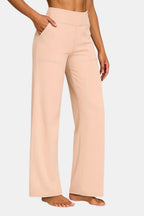 High-waist stretch straight-leg pants in light pink with a smooth waistband