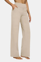 High-waist stretch pants in cream with straight-leg fit and side pockets