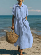 Light blue cotton button shirt dress with collar, short sleeves, gathered waist