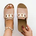 Beige open-toe sandals with gold-tone square buckle and cushioned insole
