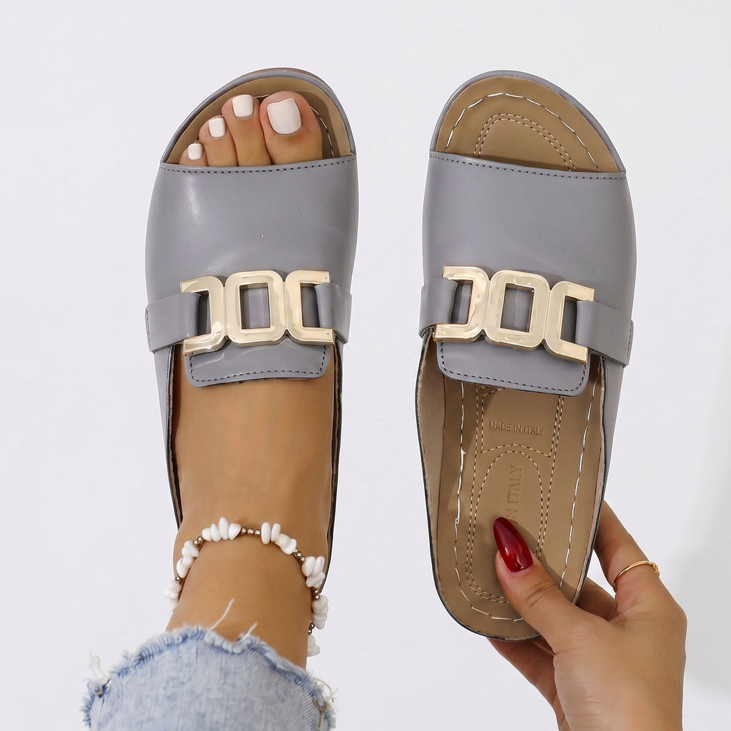 Light gray open-toe sandals with gold-tone square buckle and stitched footbed