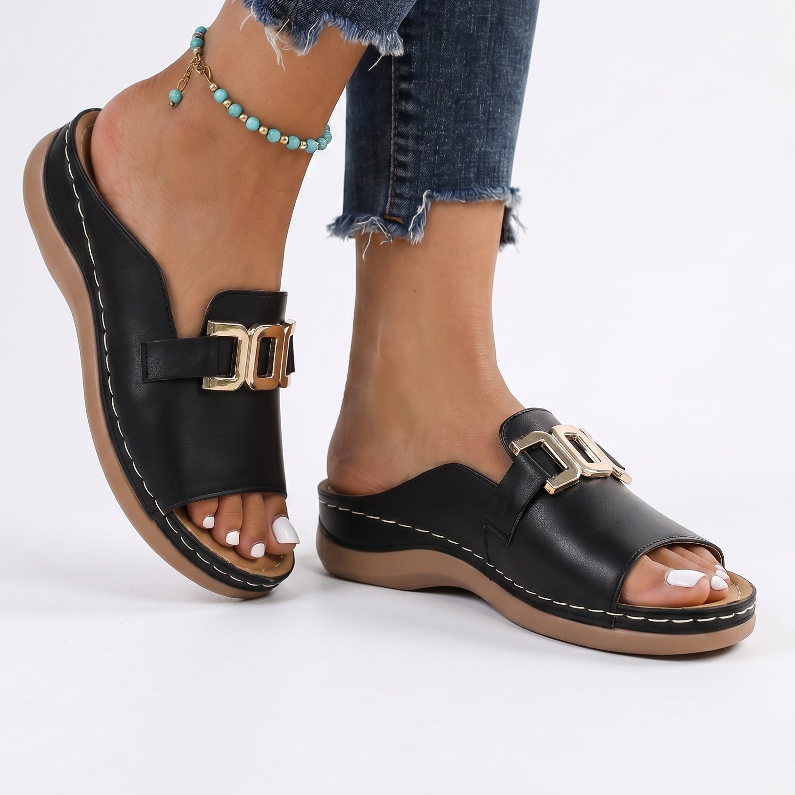 Women's open-toe sandals, black leather-look, gold buckle straps, cushioned platform