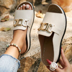 Light beige open-toe sandals with gold-tone square buckle and stitched edges