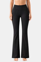 Black flared leggings with high waistband, full-length straight legs