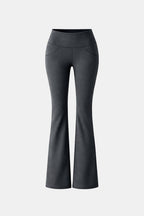 Grey flared leggings with high waistband and wide bootcut legs