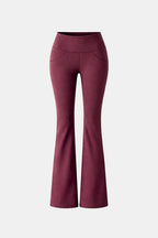 Red flared leggings with high waistband and wide bootcut legs