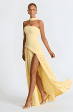 Strapless yellow maxi dress with draped bodice and high front slit, flowy skirt