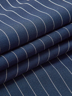 Navy-blue fabric with thin white vertical pinstripes texture close-up