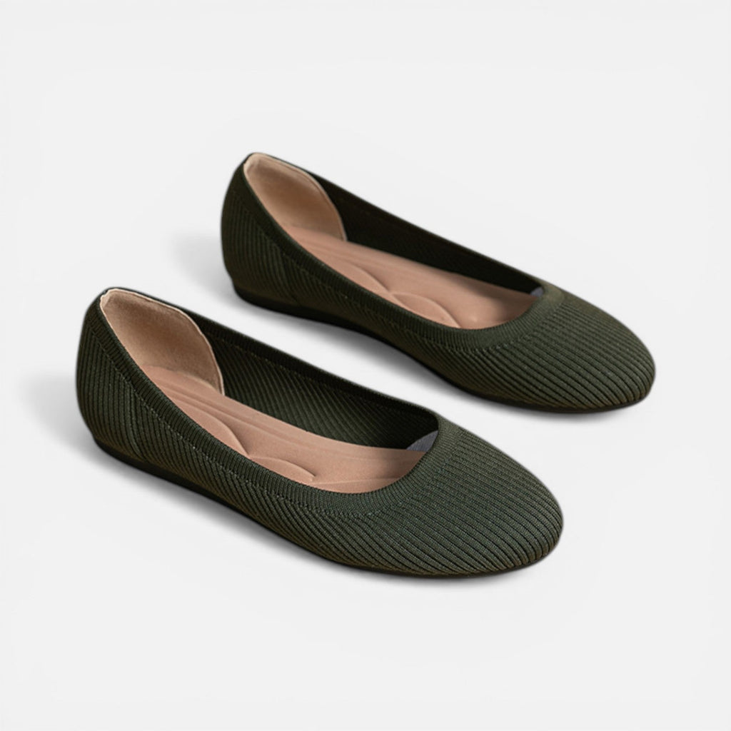 Pair of green knit ballet flats with rounded toe and slip-on fit