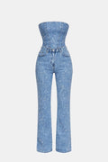 Denim blue strapless glitter jumpsuit front view with corset fit and straight pant legs