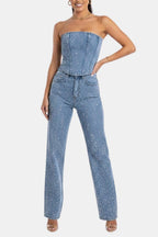 Denim blue strapless glitter jumpsuit with sculpted corset bodice and straight legs