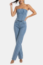 Denim blue strapless glitter jumpsuit with fitted waist and wide straight pant legs
