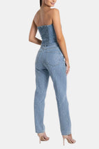 Denim blue strapless glitter jumpsuit with structured bust and high-rise slim legs