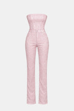 Pink strapless glitter denim jumpsuit with fitted sculpted waist and wide legs