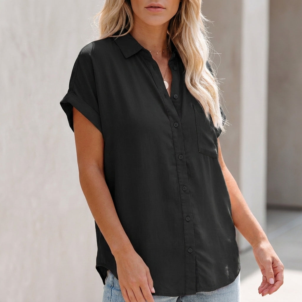 Black button-up blouse with collar, front buttons, chest pocket, short sleeves