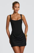 Black square-neck mini dress with boned bodice; draped ruching at skirt, thin straps