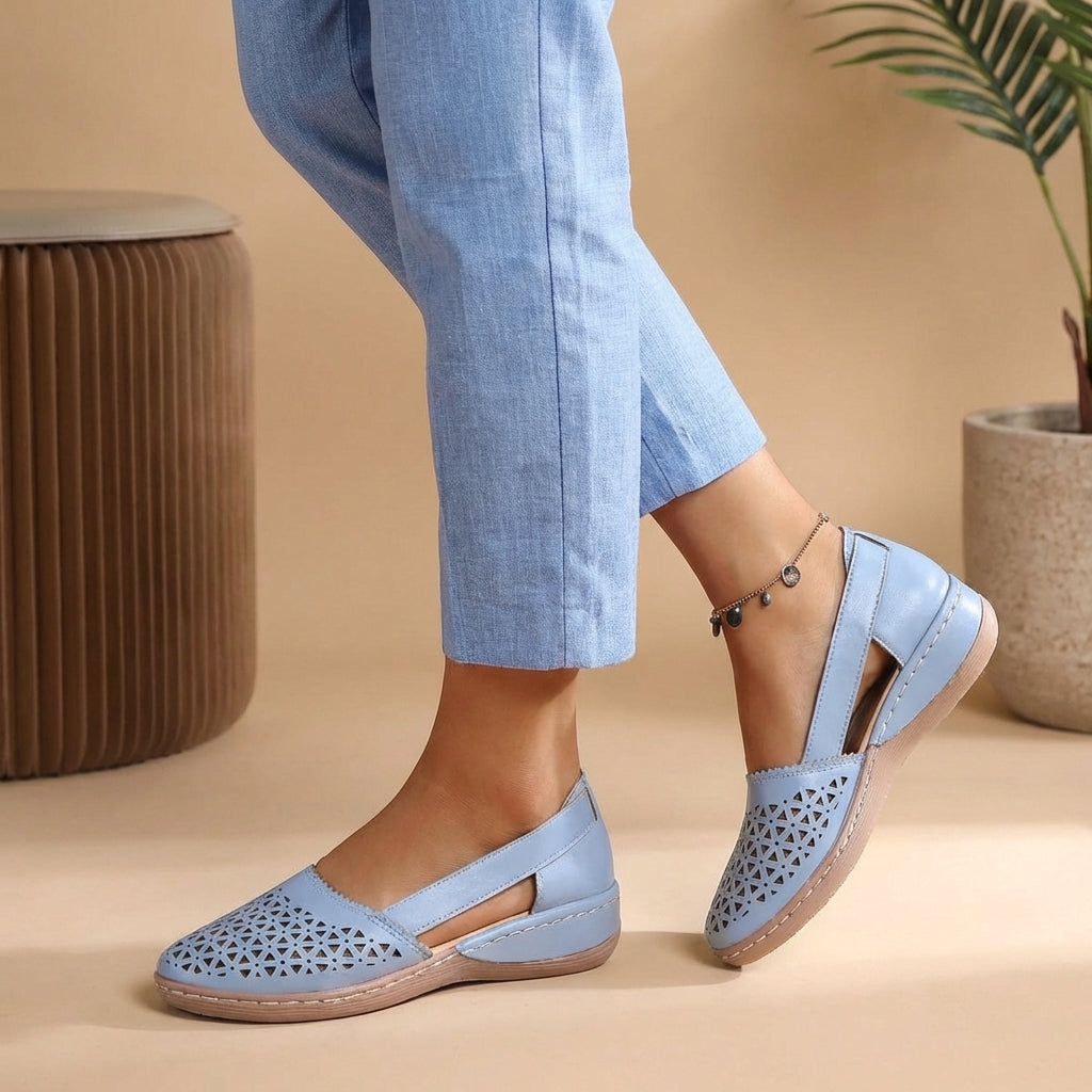 Women's slip-on casual shoes in light blue with cutout design and open side