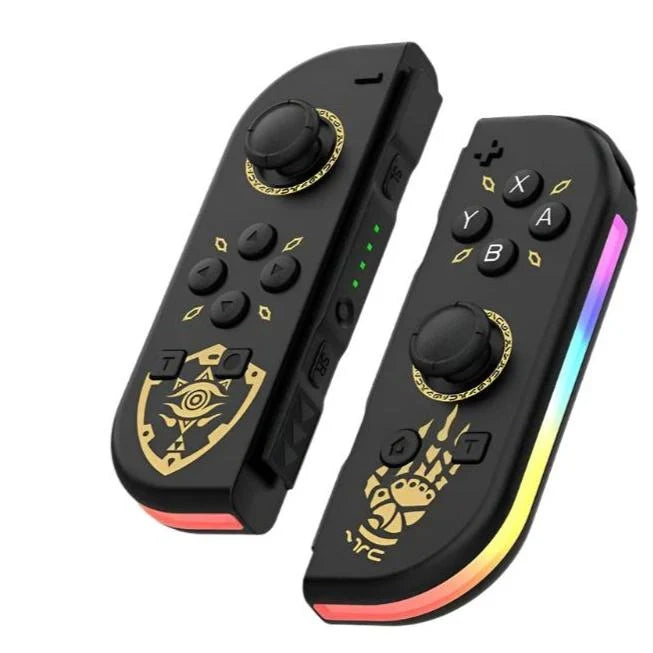 Black RGB LED handheld controllers with gold accents, joystick, ABXY buttons, rainbow strip