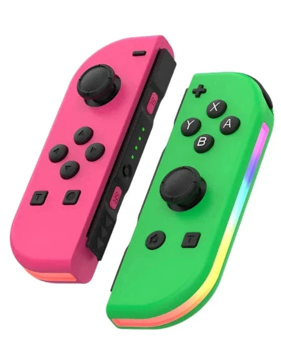 Pink and green Nintendo Switch RGB LED joy-con controllers with thumbsticks and controls.