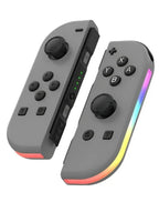 Gray Nintendo Switch RGB LED joy-con controllers with thumbsticks and button clusters.