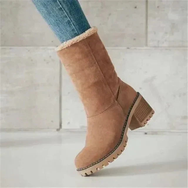 Women’s tan mid-calf winter boots with beige sherpa cuff and chunky heel