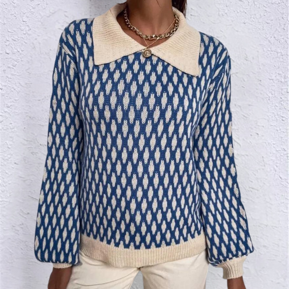 Blue patterned knitted sweater with cream collar and button front, ribbed hem