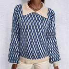 Blue patterned knitted sweater with cream collar and button front, ribbed hem