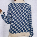 Blue and cream patterned knitted sweater with round collar and button front