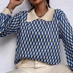 Blue patterned knitted sweater with cream collar and gold button, long sleeves