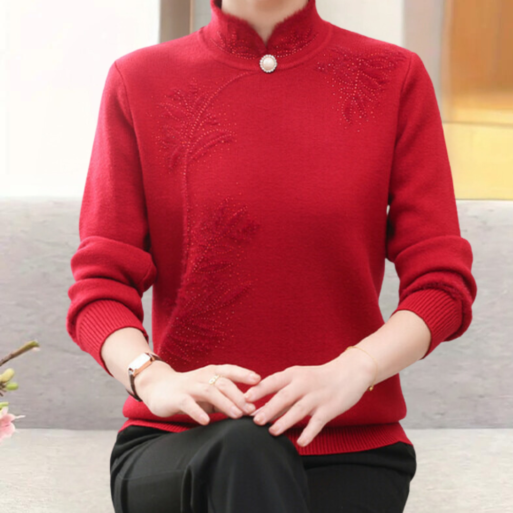 Alfhild red knit sweater with high collar, studded floral pattern, button placket