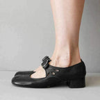 Black Mary Jane shoes with adjustable buckle strap and chunky heel